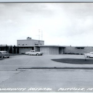 c1950s Postville, IA RPPC Community Hospital Oldsmobile Chevy Bel Air PC A107