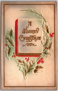 A Merry Christmas Embossed Holy Leaf Cherry & Book Posted Postcard