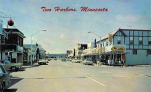 Main Street Rexall Drug Store Two Harbors Minnesota postcard