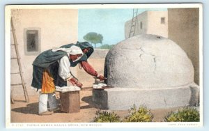 NEW MEXICO ~ PUEBLO Native American INDIAN WOMEN Baking Bread  c1910s  Postcard