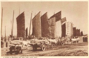 Wharf in Manchukuo with many Junks (Cargo Boats) China c1930s Vintage Postcard