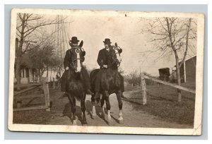 Vintage 1910's RPPC Postcard - Two Men in Derby's Riding Horses in Country