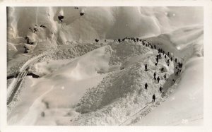 GROUP OF MEN CLEARING THE RAILROAD TRACKS OF MASSIVE SNOW-PHOTO POSTCARD