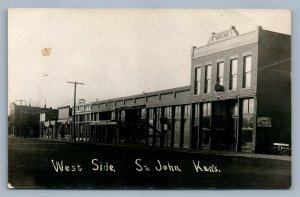 ST.JOHN KS WEST SIDE ANTIQUE REAL PHOTO POSTCARD RPPC STREET SCENE SIGNS