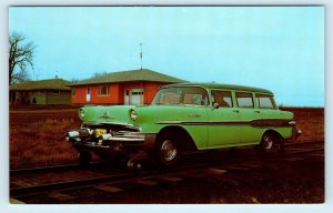 FAIRMONT, MN Minnesota~ 1957 PONTIAC RAILWAY/HIGHWAY Motor Car AD  Postcard