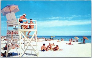 VINTAGE POSTCARD THE WHITE SAND AND WARM WATERS OF PENSACOLA BEACH FLORIDA 1957