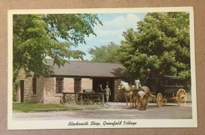 VINTAGE UNUSED  POSTCARD BLACKSMITH SHOP DEARBORN MICH.