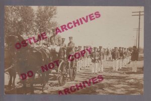 Huron SOUTH DAKOTA RPPC 1910 FIRE DEPARTMENT Parade FIREMEN MARCHING Wagon SD 2