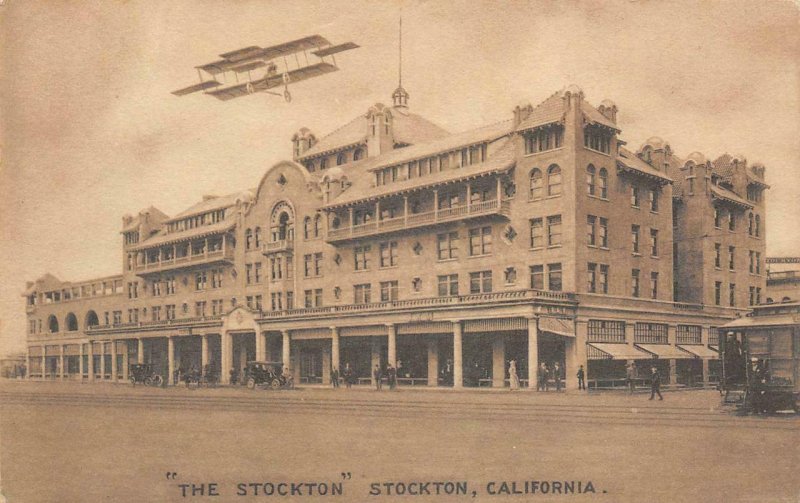 THE STOCKTON Stockton, CA Hotel, Biplane Street View 1910 Vintage Postcard