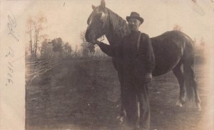 MAN HOLDING REINS OF HORSE~1906 REAL PHOTO POSTCARD