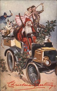 Christmas Santa Claus Pierrots Ballet Dancer in Car TUCK c1910 Postcard