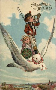 PFB No 9187 Christmas Boy and Girl on Dove c1910 Gel Vintage Postcard