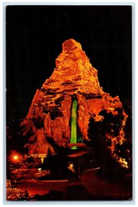 c1960's Matterhorn At Nigh Clearly Visible In Disneyland Anaheim CA Postcard