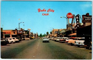 c1960s Yuba City, CA Main St Downtown Fritz Vibe Postcard Lloyds Rexall Cali A91