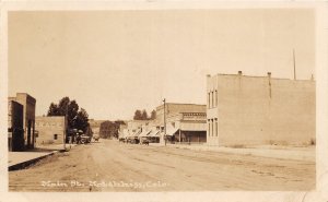 J32/ Hotchkiss Colorado RPPC Postcard c1910 Main Street Stores Garage  14