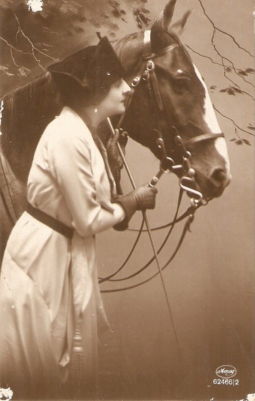 Pretty lady with her horse Nice vintage German postcard