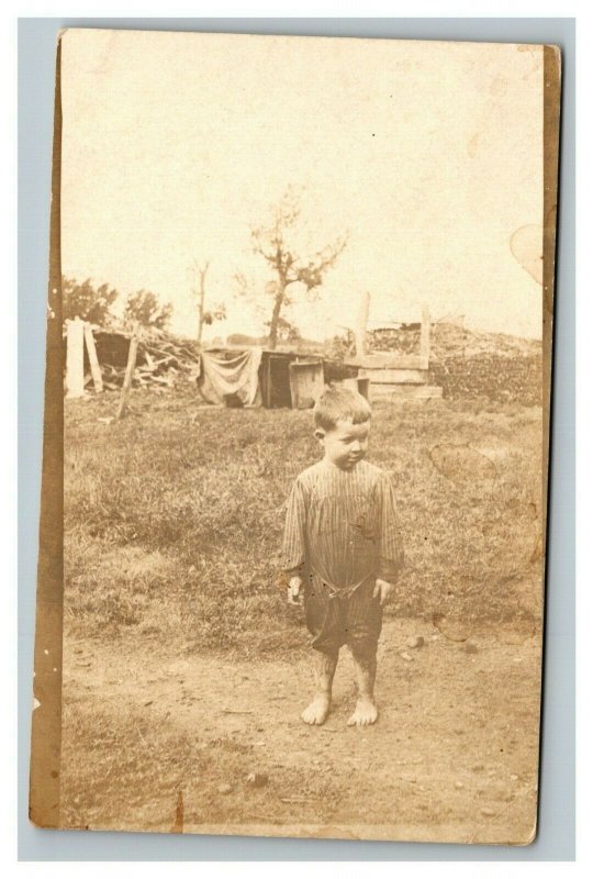 Vintage 1910's RPPC Postcard Young Child Barefoot on a Country Dirt Road