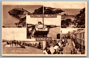 Postcard Holyhead UK c1956 Greetings from Holyhead Multi View Mail Boats Street