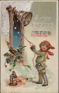 Christmas - Little Boy Ringing Bell c1910 Postcard