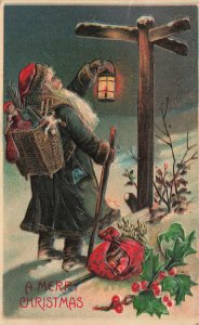 Merry Christmas Dark Green Suited Santa Claus Toys & Lantern Embossed Postcard