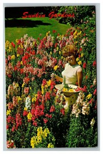 Vintage 1960's Postcard Beautiful Woman Flowers Sunken Garden St. Petersburg FL