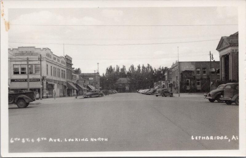 6th Street & 4th Ave. Lethbridge Alberta AB Kitson's Pharmacy RPPC Postcard E24