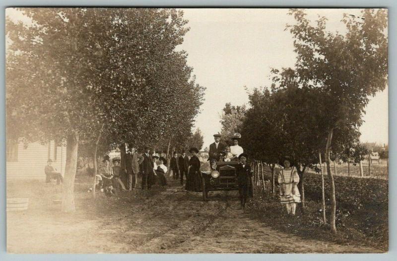 Real Photo Postcard~Family in Hand Crank Automobile~Group Photo~c1908 RPPC 