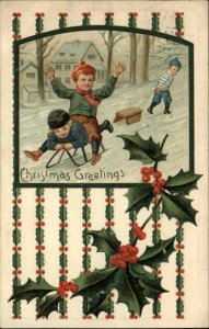 CHRISTMAS Cute Kids Children Sledding HOLLY BORDER c1910 Postcard