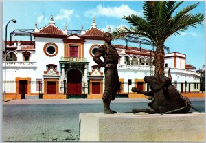 VINTAGE CONTINENTAL SIZE POSTCARD BULLFIGHTING RING AND MONUMENT SEVILLE SPAIN