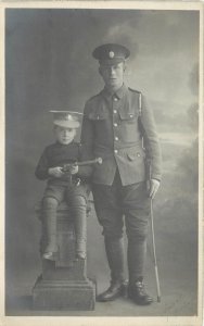 RPPC Postcard Teenager Dressed Like WWI Soldier and Little Boy With Toy Rifle