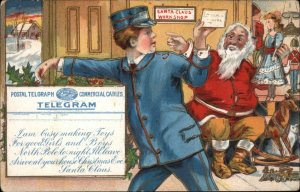 Christmas Telegram Delivery Man in Santa's Workshop c1910 Vintage Postcard