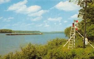 LOUISVILLE KENTUCKY BEACON LIGHT ON OHIO RIVER W/ BARGE PASSING POSTCARD c1960s