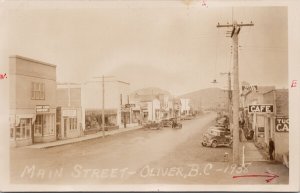 Main Street Oliver BC Oliver Hotel Howe Cash Grocery Cafe 1938 RPPC Postcard H35