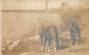 J21/ Rocklake North Dakota RPPC Postcard c1910 Bridge Man Horse Tower  205