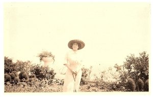 RPPC Postcard Woman in Dress Big Hat in Garden