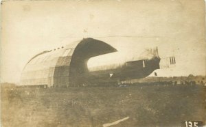 RPPC Postcard 135 Zeppelin Partially in Hangar, Unknown Europe unposted