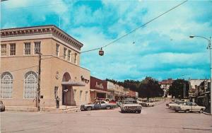 Autos 1960s Street Scene Sonora Texas Walcott & Sons postcard 983