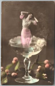 GIRL IN CHAMPAIGNE GLASS PHOTOMONTAGE 1918 ANTIQUE REAL PHOTO POSTCARD RPPC