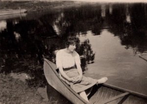 RPPC Antique Postcard Young Woman Sitting in Canoe Ki8