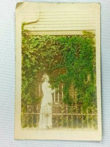 Vintage Postcard 1910's RPPC Woman Standing in Front of House with Plant Vines