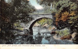 Stone arch bridge Near vine would park Topeka Kansas  