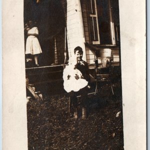 c1910s Outdoor Children RPPC House Porch Boy Hold Baby Smile Sunny Photo PC A254