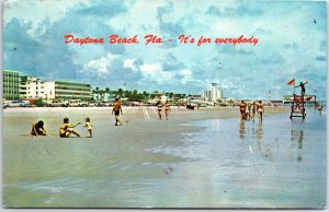 VINTAGE POSTCARD CROWDS ON THE BEACH AT DAYTONA LINED WITH CARS POSTED 1976