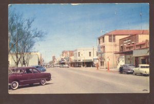 WINSLOW ARIZONA ROUTE 66 DOWNTOWN STREET SCENE OLD CARS STORES POSTCARD