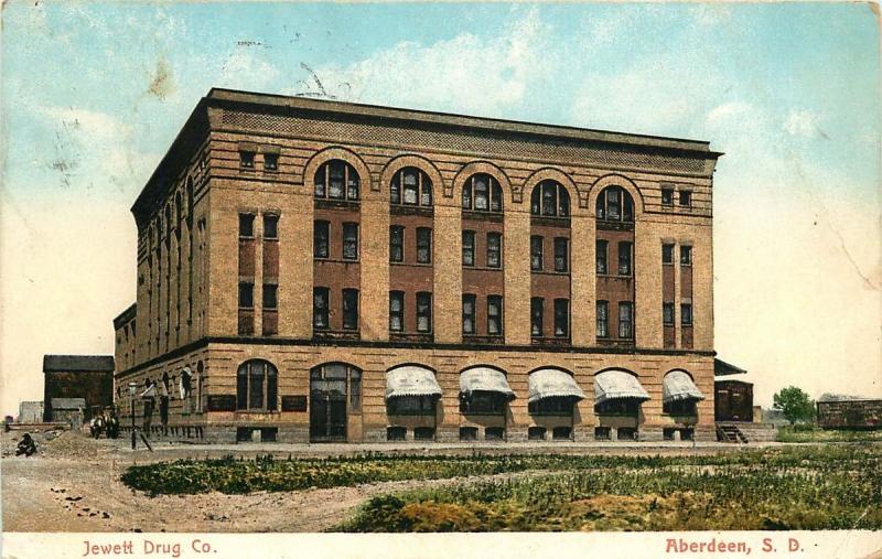 ABERDEEN SD JEWETT DRUG COMPANY BUILDING PHOTO POSTCARD c1910