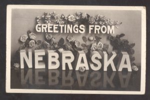 RPPC GREETINGS FROM NEBRASKA LARGE LETTER FLORAL REAL PHOTO POSTCARD