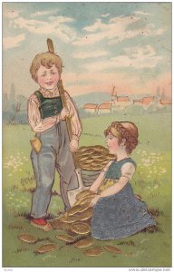 Boy and Girl in a field gathering flat bread, 00-10s