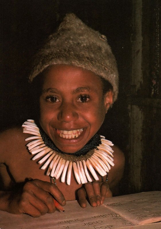 VINTAGE CONTINENTAL SIZE POSTCARD SCHOOLBOY FROM ENGA PROVINCE PAPUA NEW GUINEA