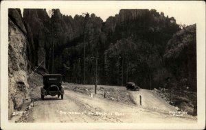 South Dakota? Cars on Needles Road Switchback Real Photo Postcard c1920