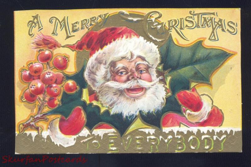 ANTIQUE VINTAGE CHRISTMAS POSTCARD SANTA CLAUS FACE IN HOLLY